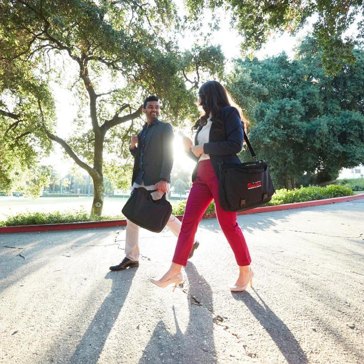 Mutiple media - Graduate business MBA students walking